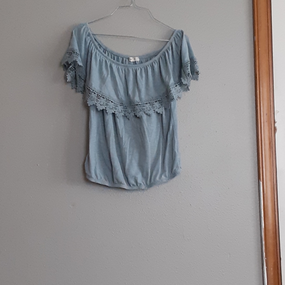 Over shoulder blue top